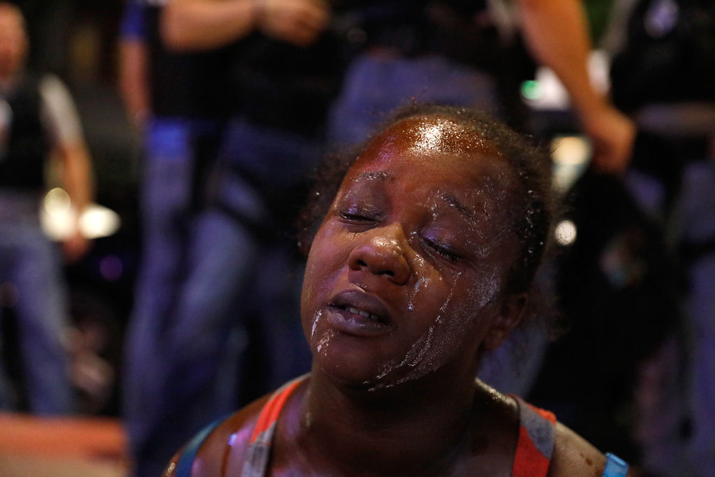 Lakeshia Starks is detained by police